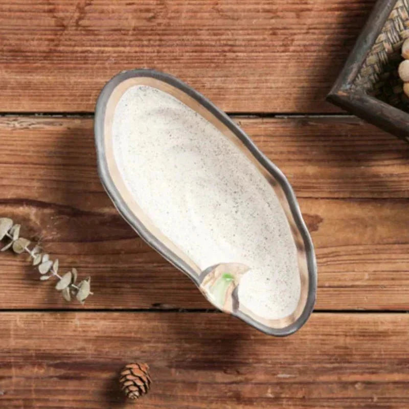 Hom & Ember – Elegant Shell-Shaped Serving Platters in Soft Tones for a Serene Dining Experience