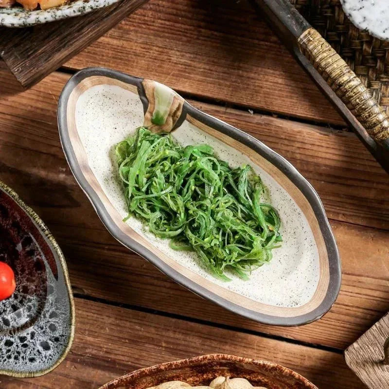 Hom & Ember – Elegant Shell-Shaped Serving Platters in Soft Tones for a Serene Dining Experience